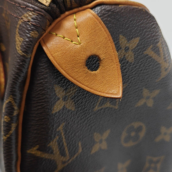 SPEEDY 25 Monogram Coated Canvas Brown