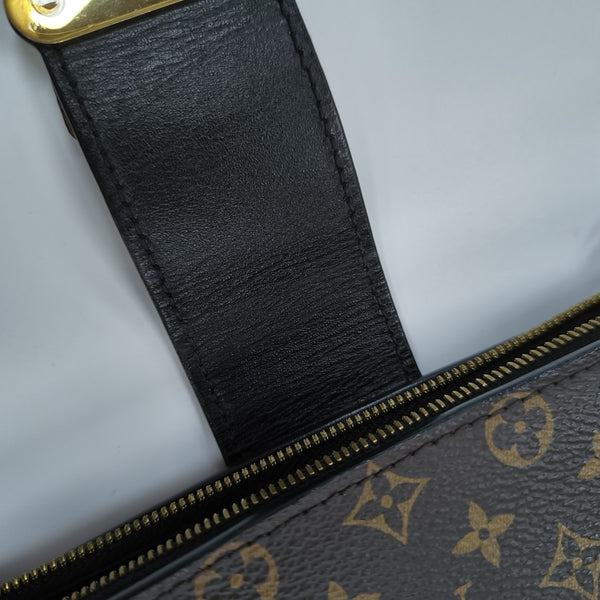 TRUNK Monogram Coated Canvas Brown