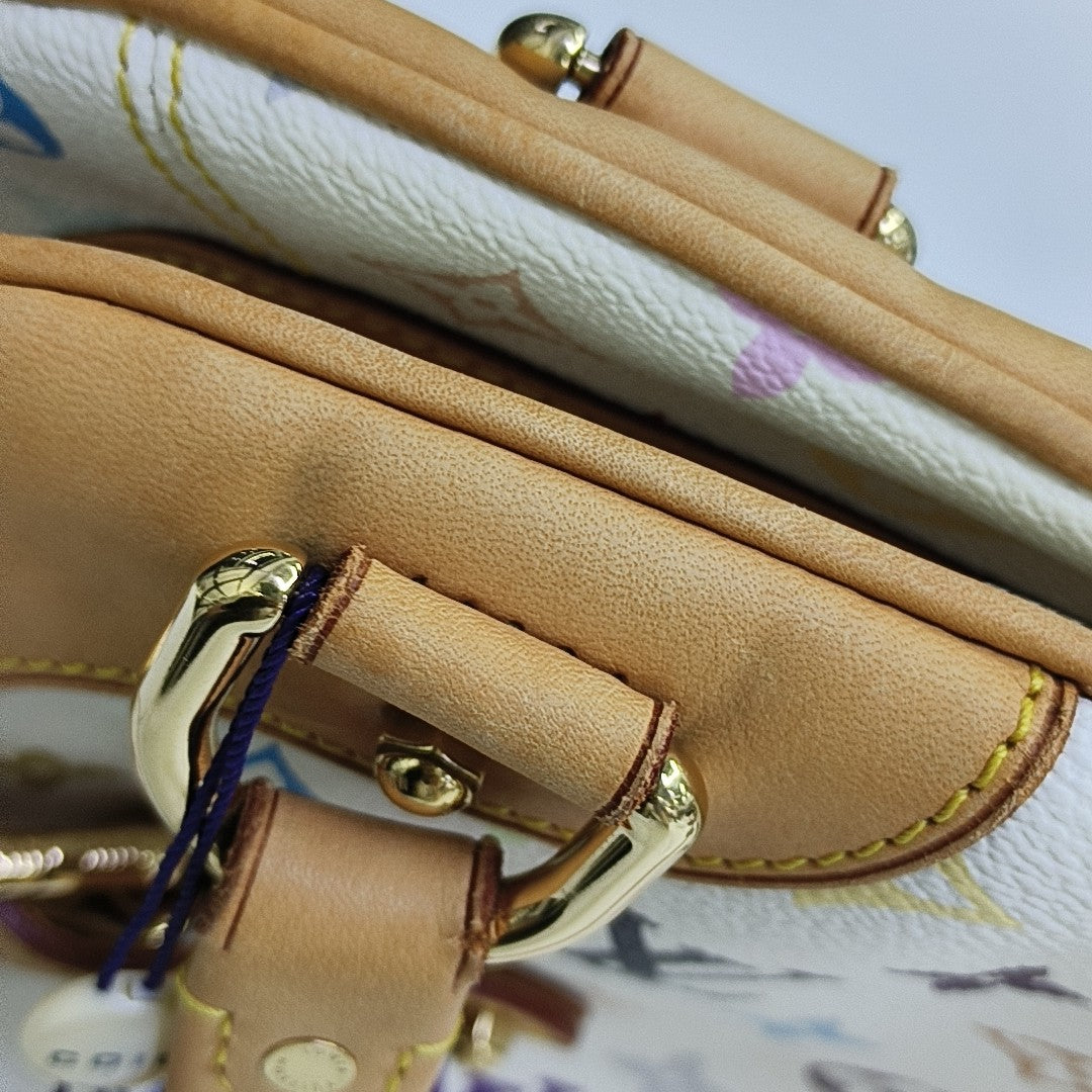 LV × TM CLAUDIA Monogram Coated Canvas White
