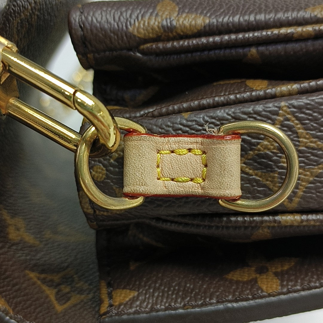 MÉTIS EAST WEST Monogram Coated Canvas Brown