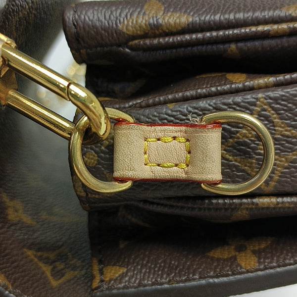 MÉTIS EAST WEST Monogram Coated Canvas Brown