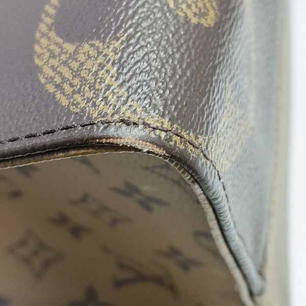 ONTHEGO MM Monogram Coated Canvas Brown