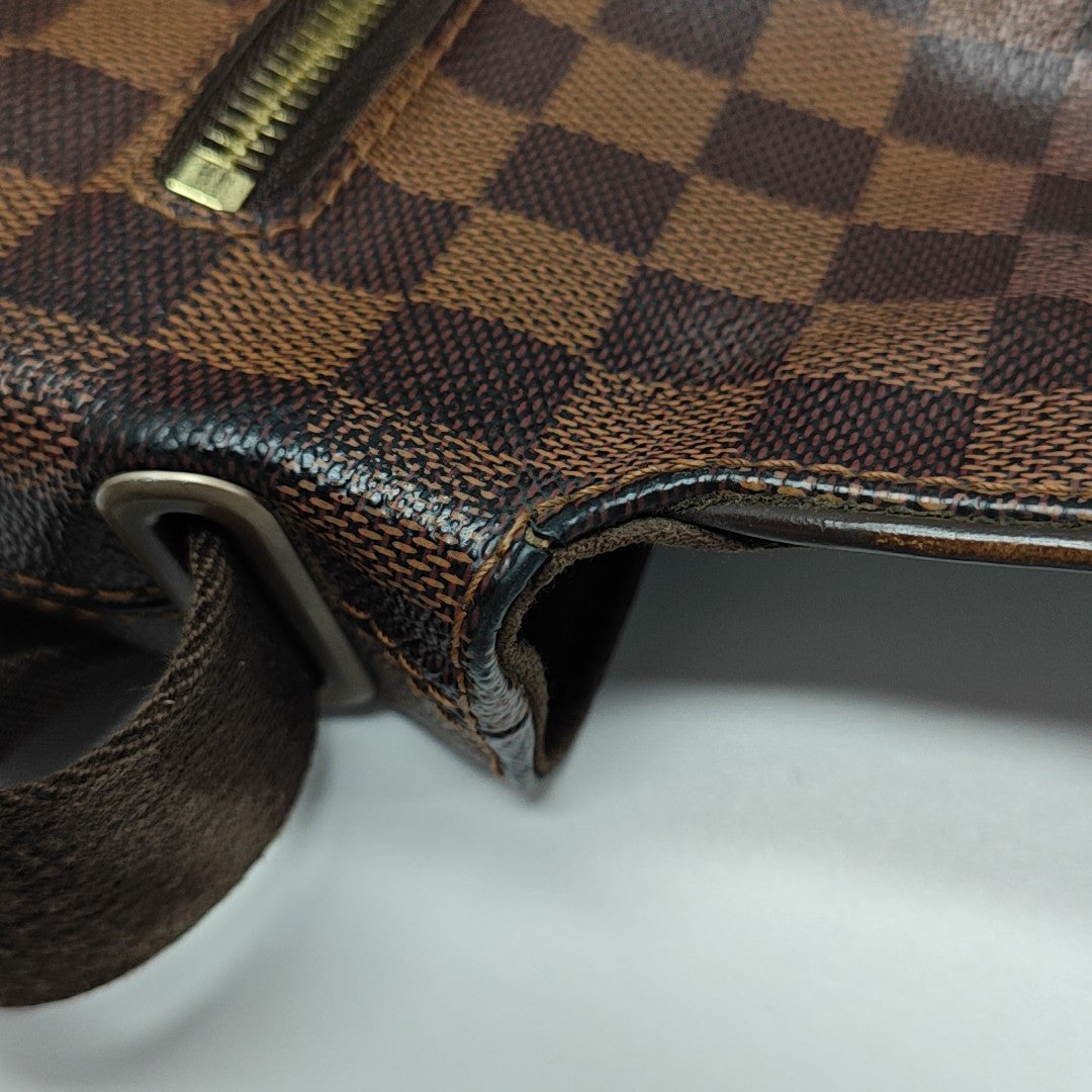 DISTRICT MM Damier Ebene Coated Canvas Brown