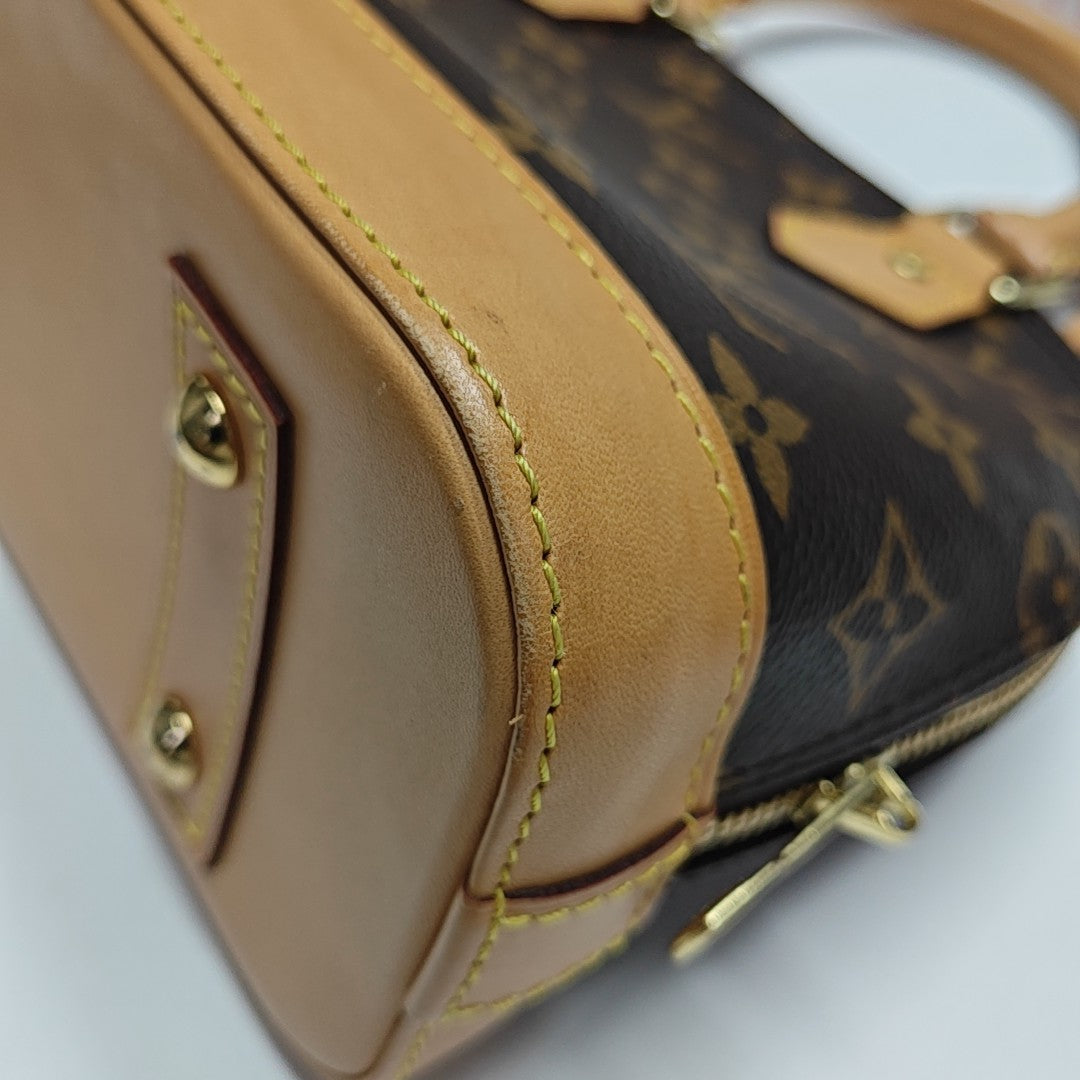 ALMA BB Monogram Coated Canvas Brown