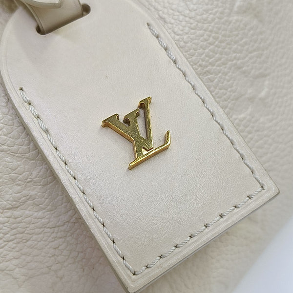 PETITE MALLE Monogram Calfskin Beige