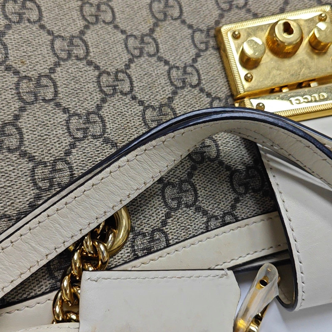 Authenticated pre-owned  Padlock Medium Monogram Coated Canvas Beige - Shoulder Bag at Looply