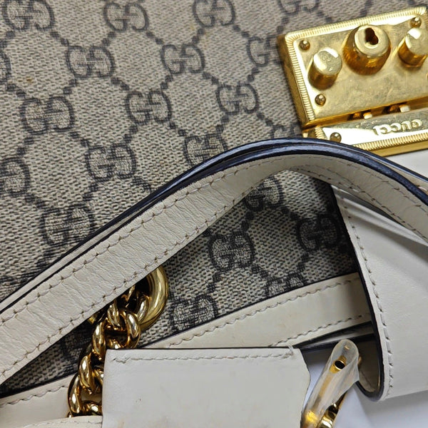 Authenticated pre-owned  Padlock Medium Monogram Coated Canvas Beige - Shoulder Bag at Looply
