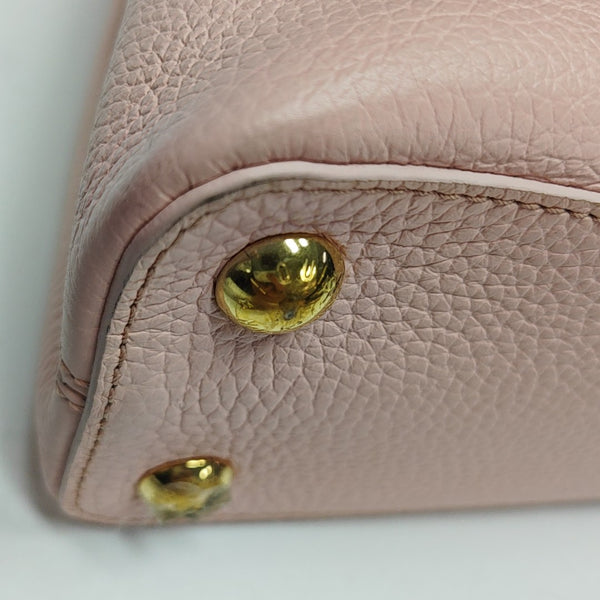 Authenticated pre-owned  CAPUCINES PM Calfskin Pink - Shoulder Bag at Looply