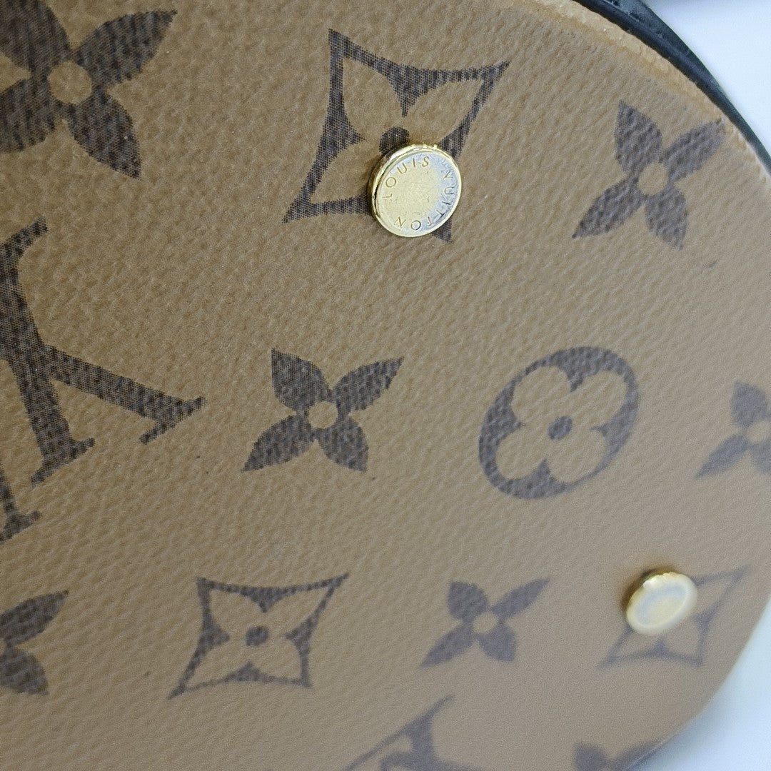 CANNES PM Monogram Coated Canvas Brown