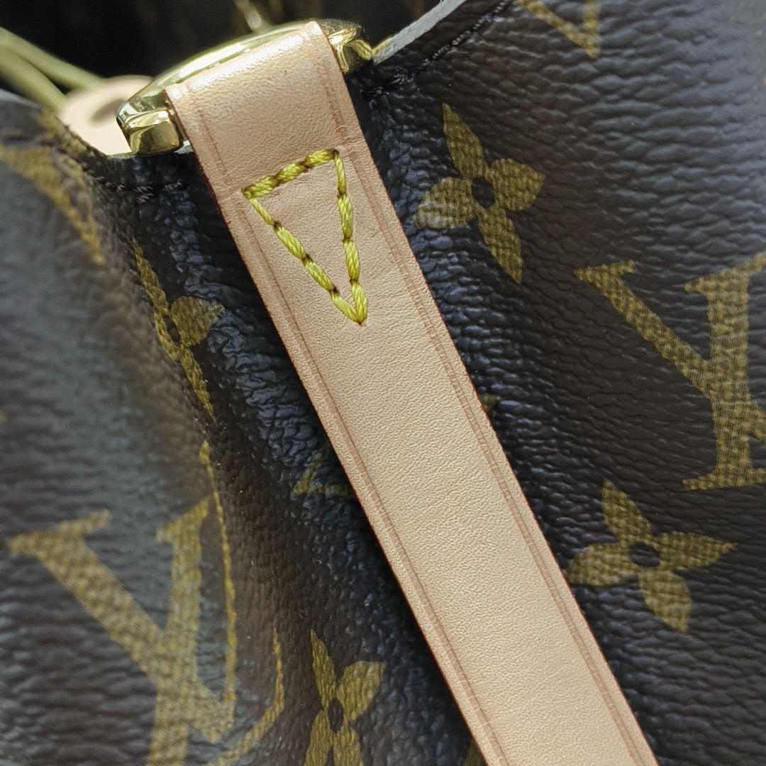 MONTAIGNE Monogram Coated Canvas Brown