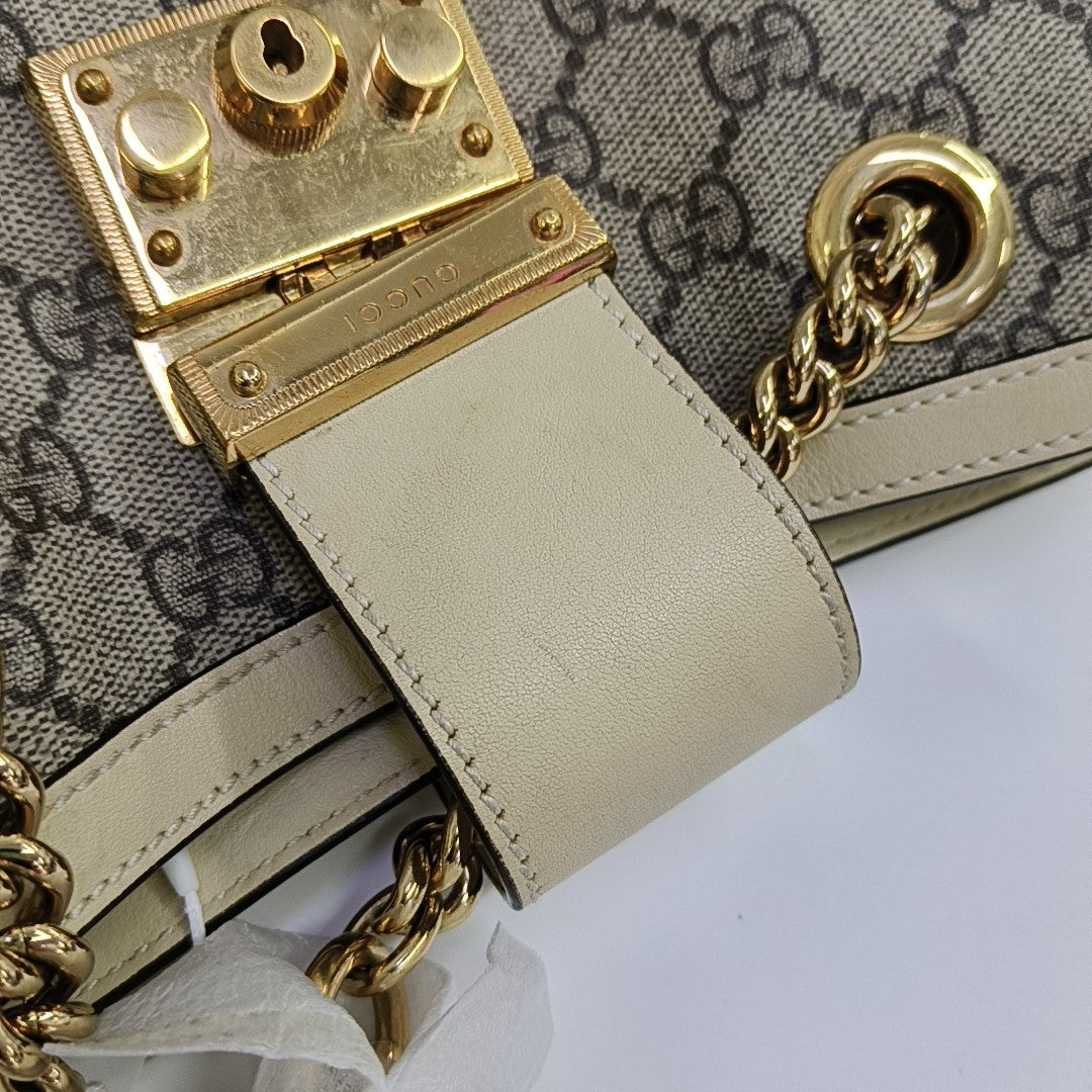Padlock Small Monogram Coated Canvas Beige