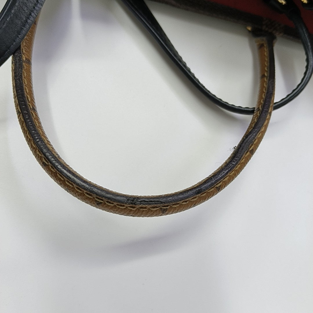 ONTHEGO GM Monogram Coated Canvas Brown