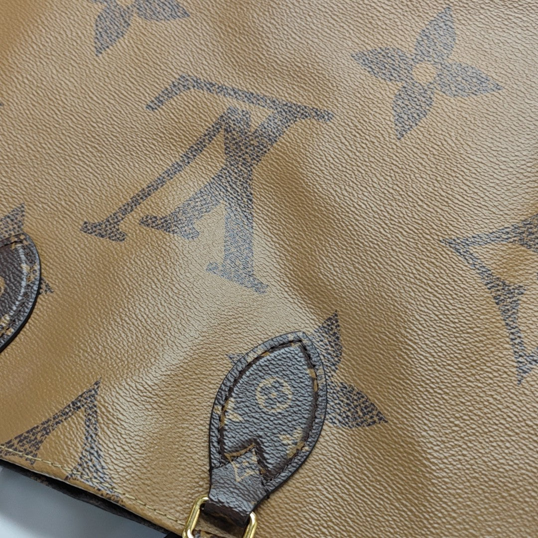 ONTHEGO MM Monogram Coated Canvas Brown
