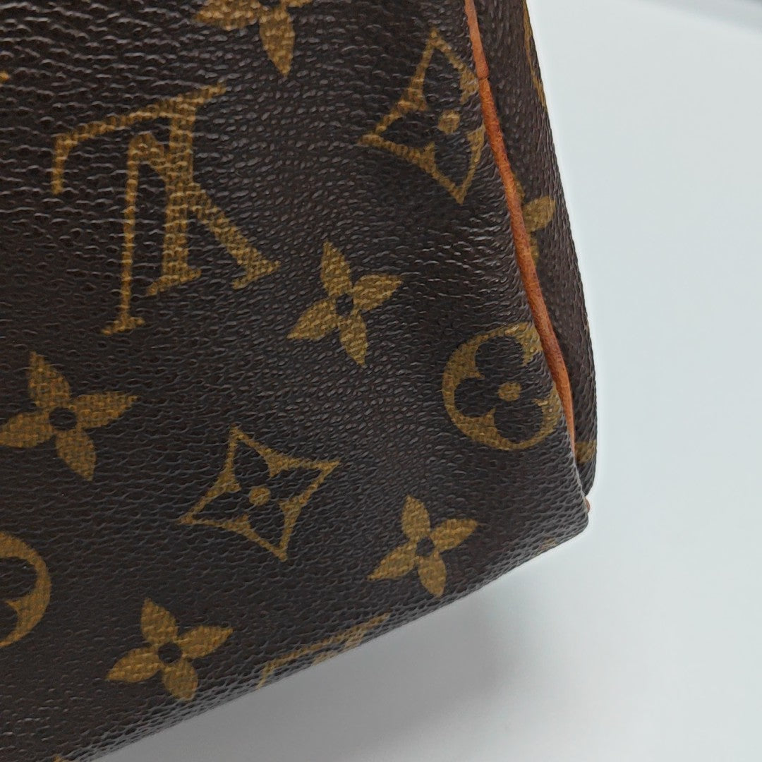 SPEEDY 25 Monogram Coated Canvas Brown