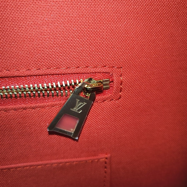 ONTHEGO MM Monogram Coated Canvas Brown