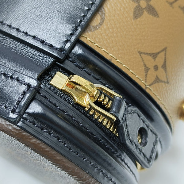 CANNES PM Monogram Coated Canvas Brown