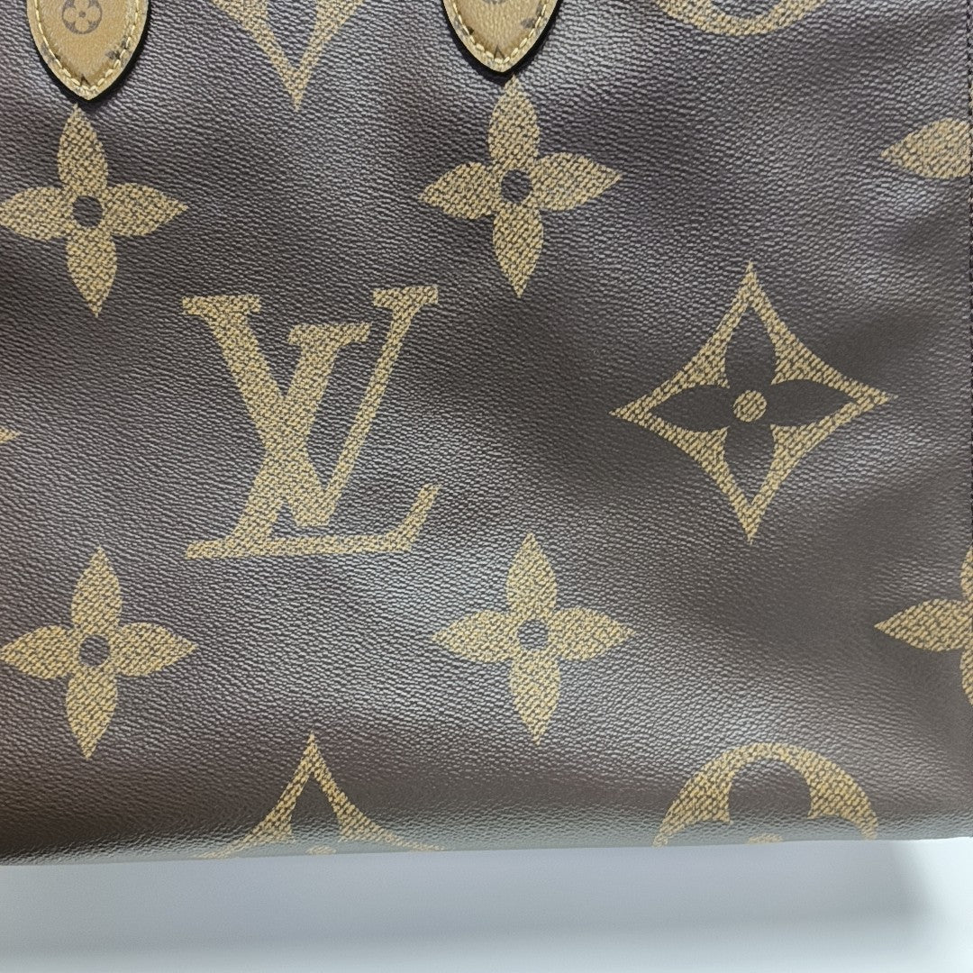 ONTHEGO GM Monogram Coated Canvas Brown