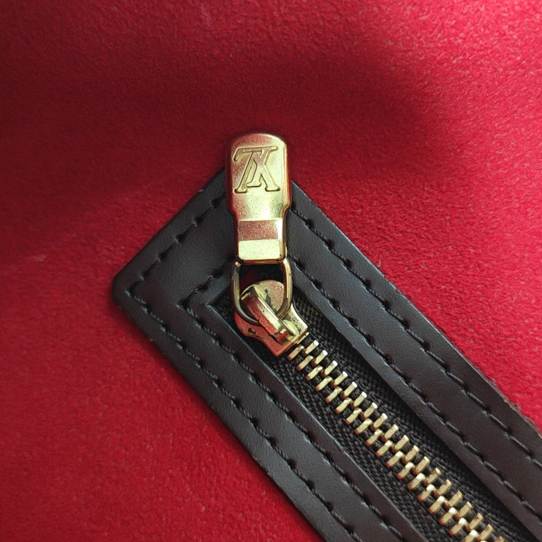 HAMPSTEAD PM Damier Ebene Coated Canvas Brown