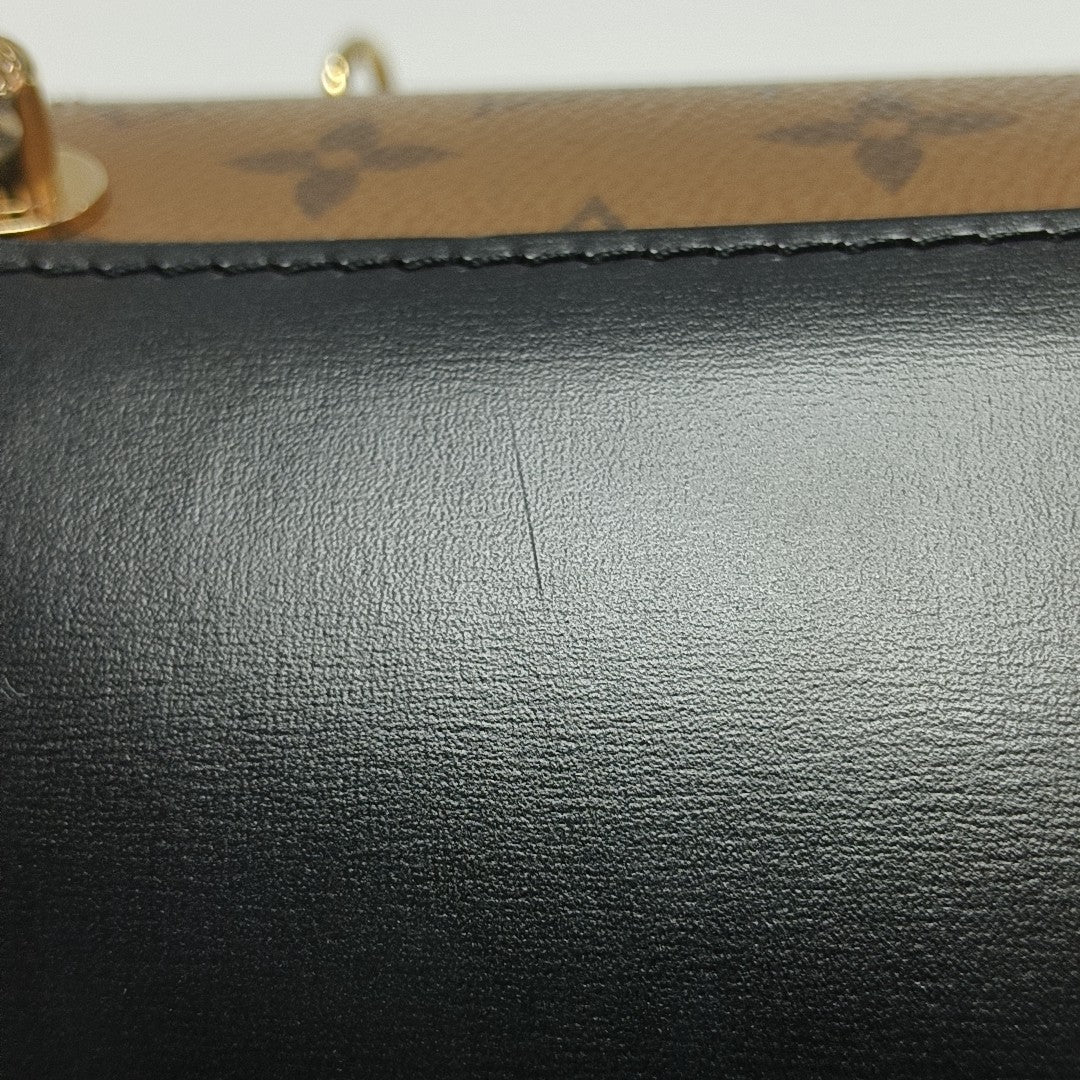CANNES PM Monogram Coated Canvas Brown