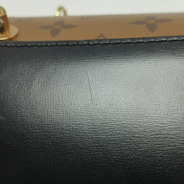 CANNES PM Monogram Coated Canvas Brown