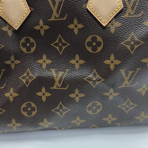 SPEEDY 25 Monogram Coated Canvas Brown
