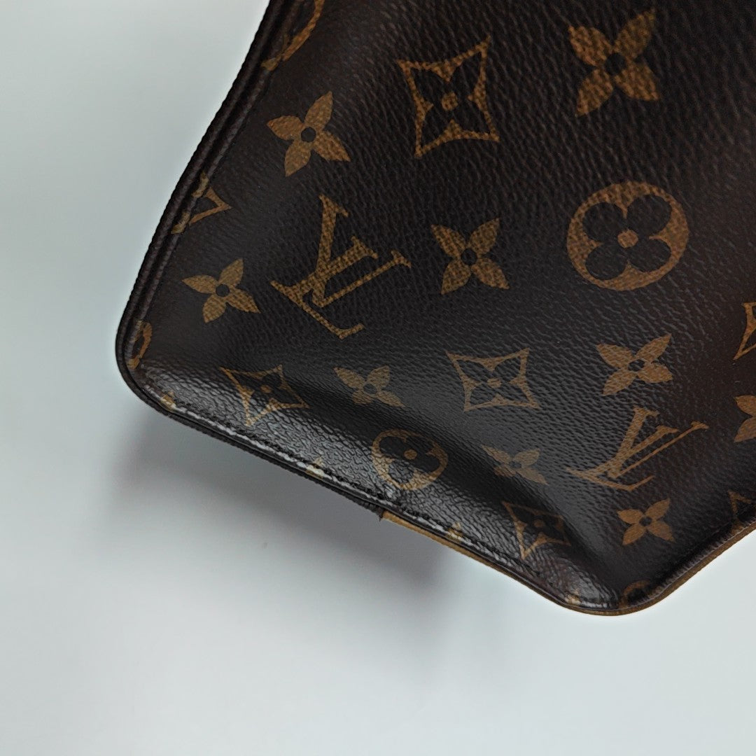 ONTHEGO MM Monogram Coated Canvas Brown