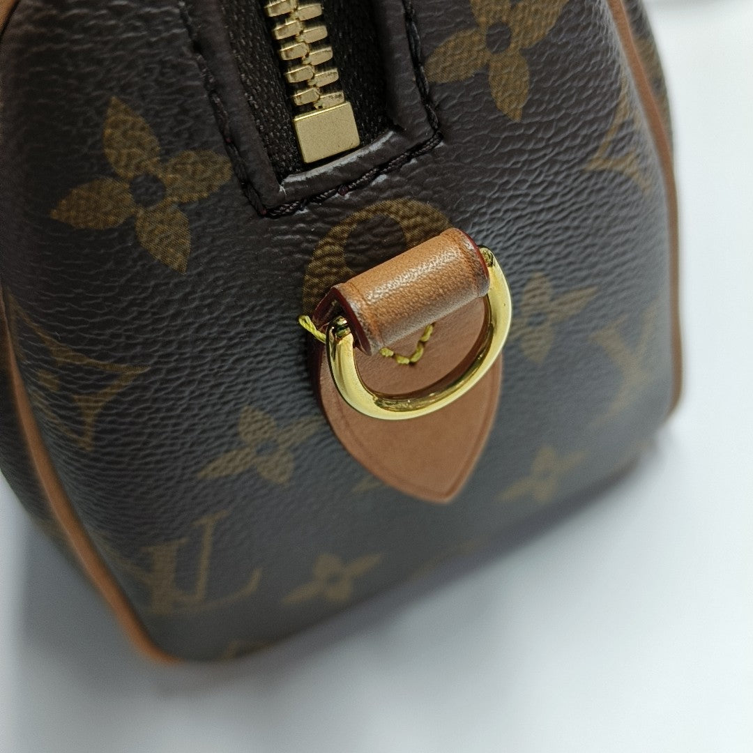 SPEEDY 20 Monogram Coated Canvas Brown