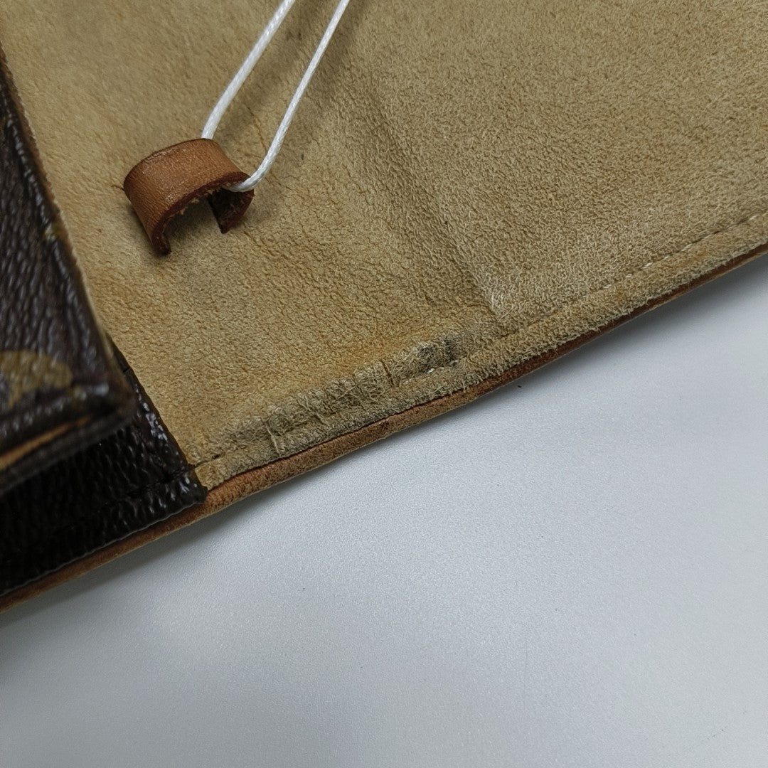 TWIN GM Monogram Coated Canvas Brown