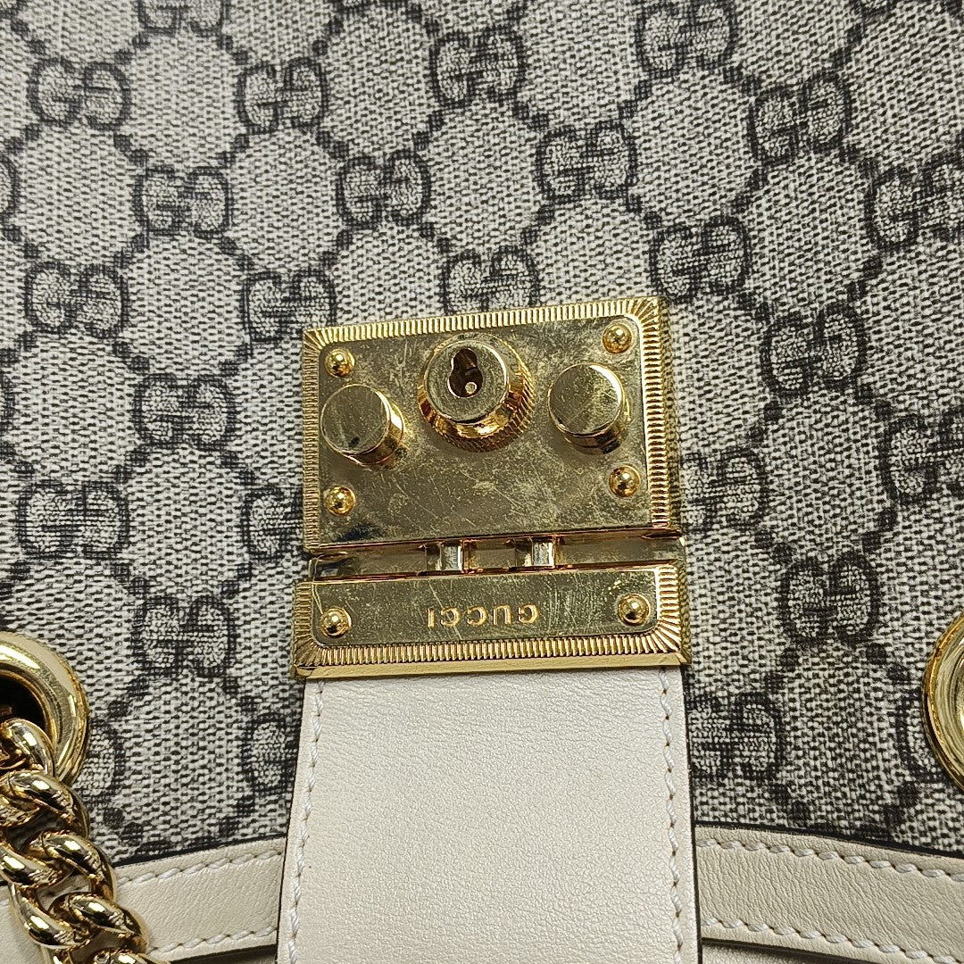 Padlock Small Monogram Coated Canvas Beige