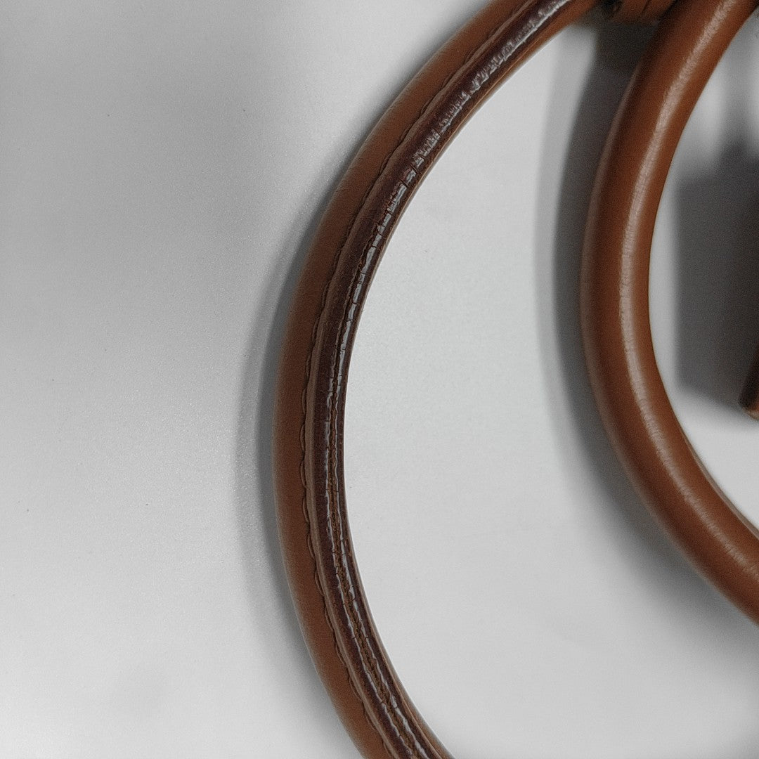 MONTAIGNE Monogram Coated Canvas Brown