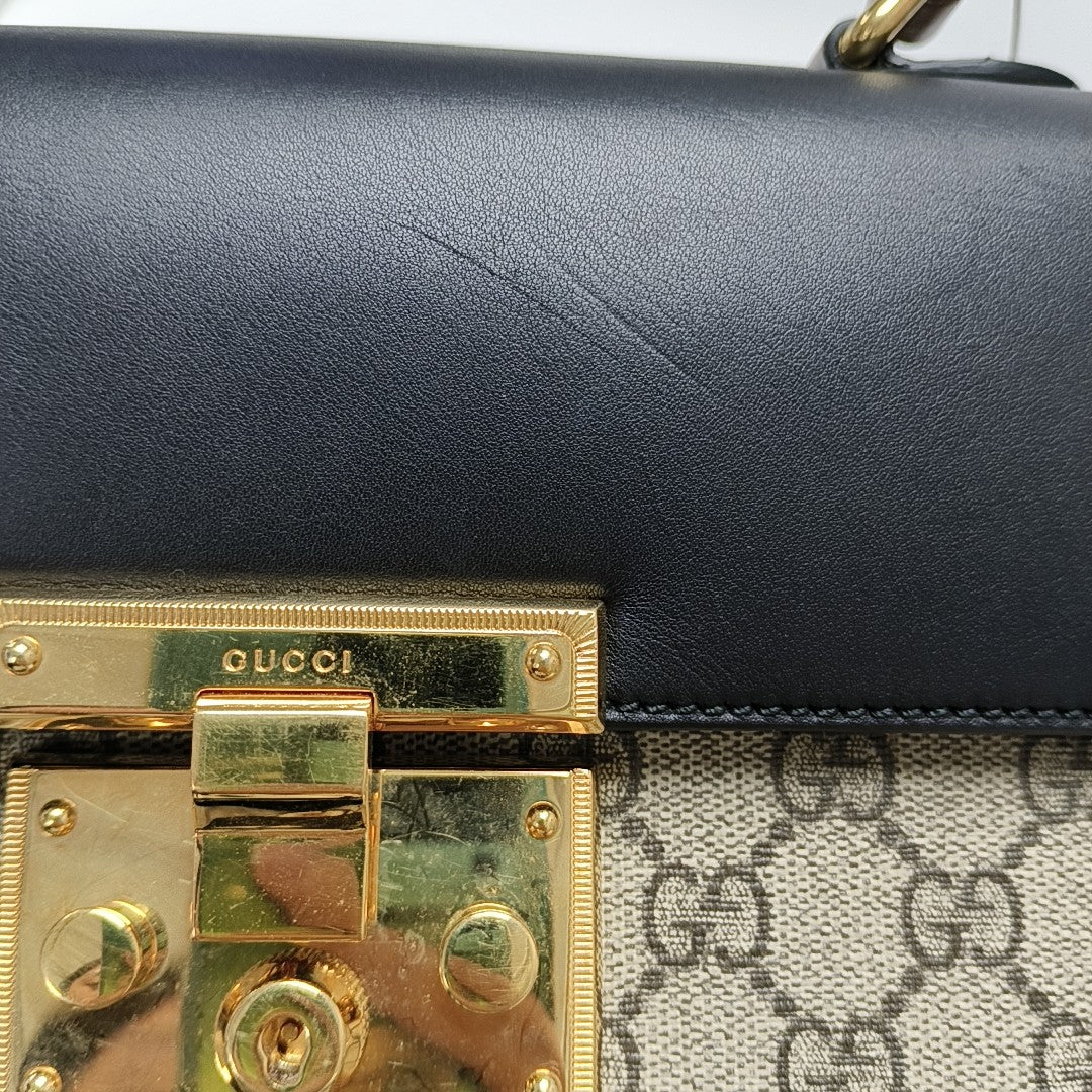 Padlock Small Monogram Coated Canvas Beige
