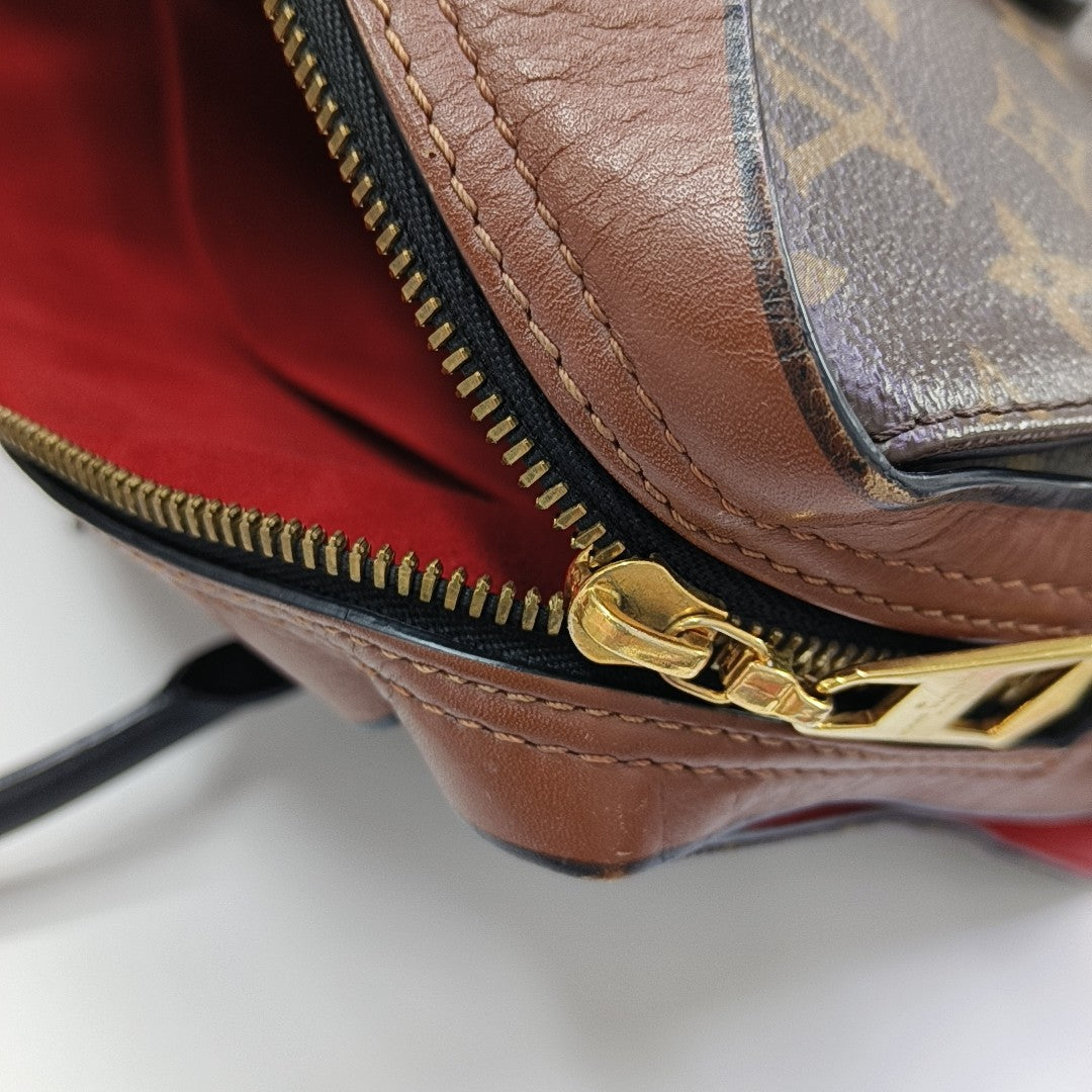 TUILERIES Monogram Coated Canvas Brown