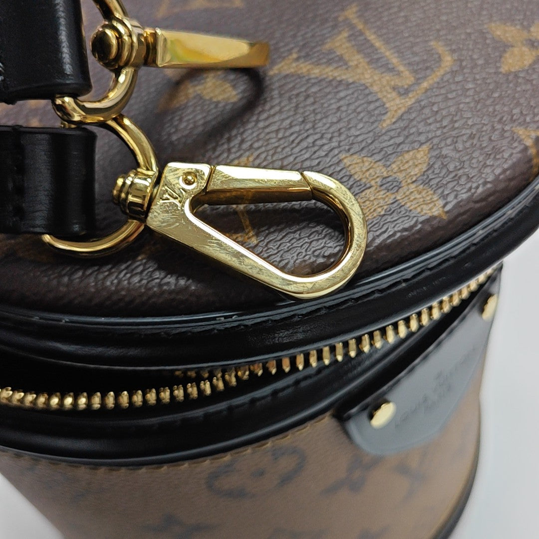 CANNES PM Monogram Coated Canvas Brown