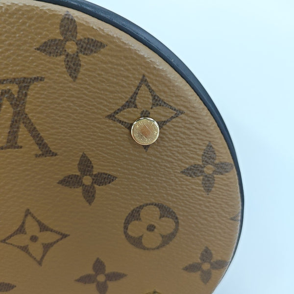 CANNES PM Monogram Coated Canvas Brown