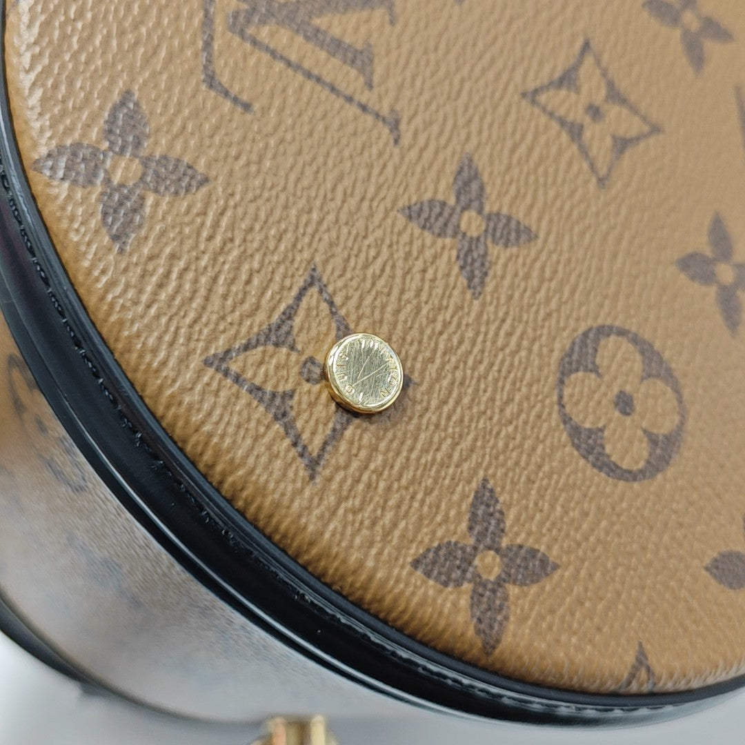 CANNES PM Monogram Coated Canvas Brown