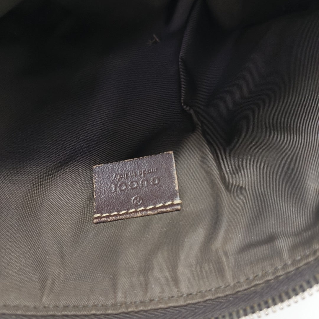 Monogram Coated Canvas Clutch Brown