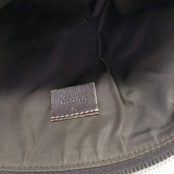 Monogram Coated Canvas Clutch Brown