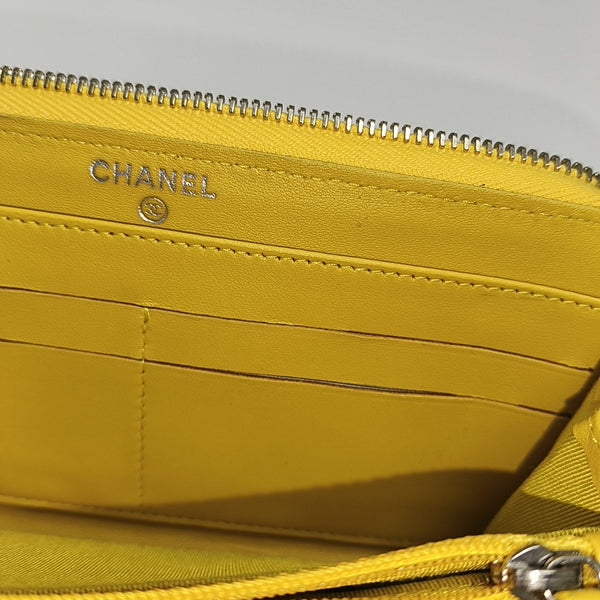 Authenticated pre-owned  WOC Quilted Lambskin Yellow Wallet - Wallet at Looply