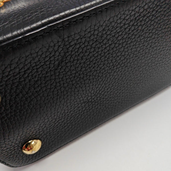 Authenticated pre-owned  CAPUCINES MM Calfskin Black - Shoulder Bag at Looply