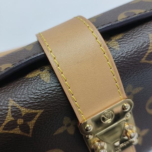 Pochette Mia Monogram Coated Canvas Brown