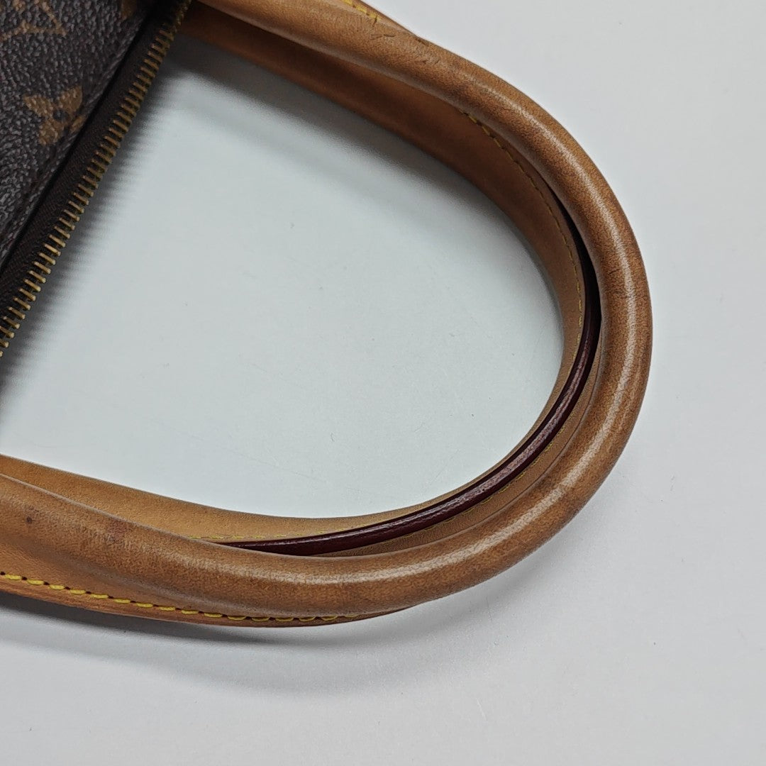 RIVOLI MM Monogram Coated Canvas Brown