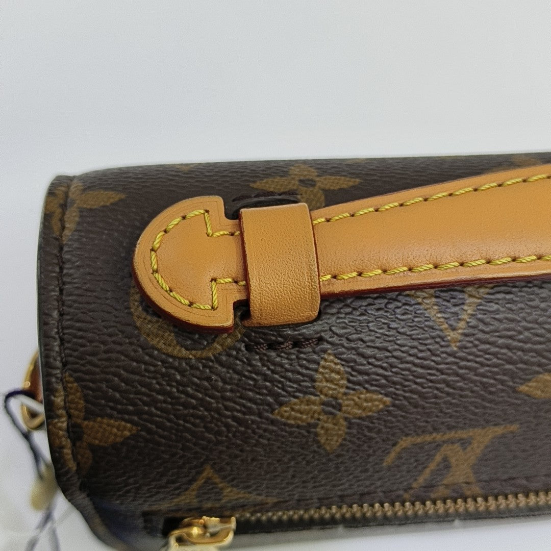 MÉTIS EAST WEST Monogram Coated Canvas Brown