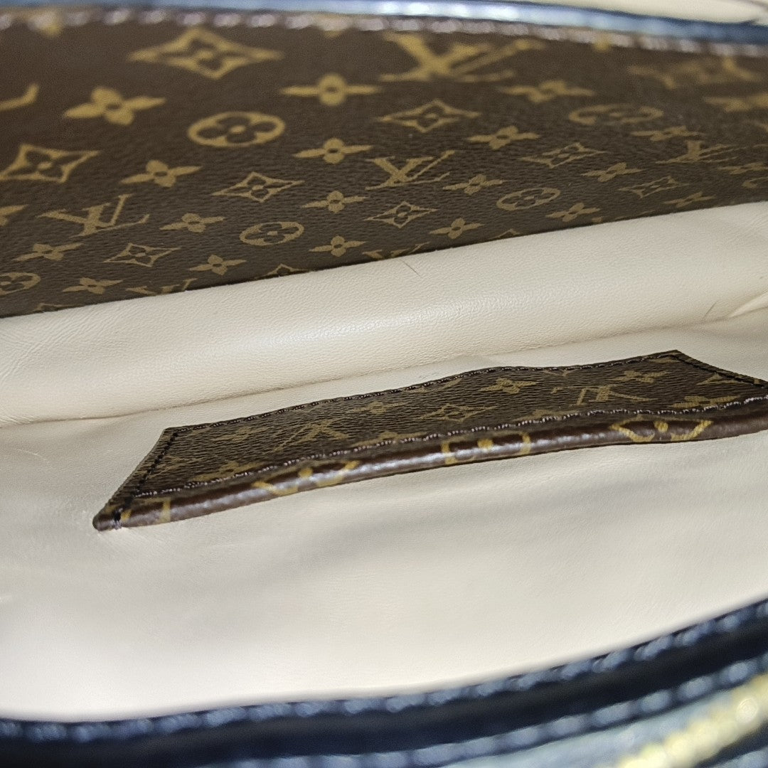 TRUNK Monogram Coated Canvas Brown