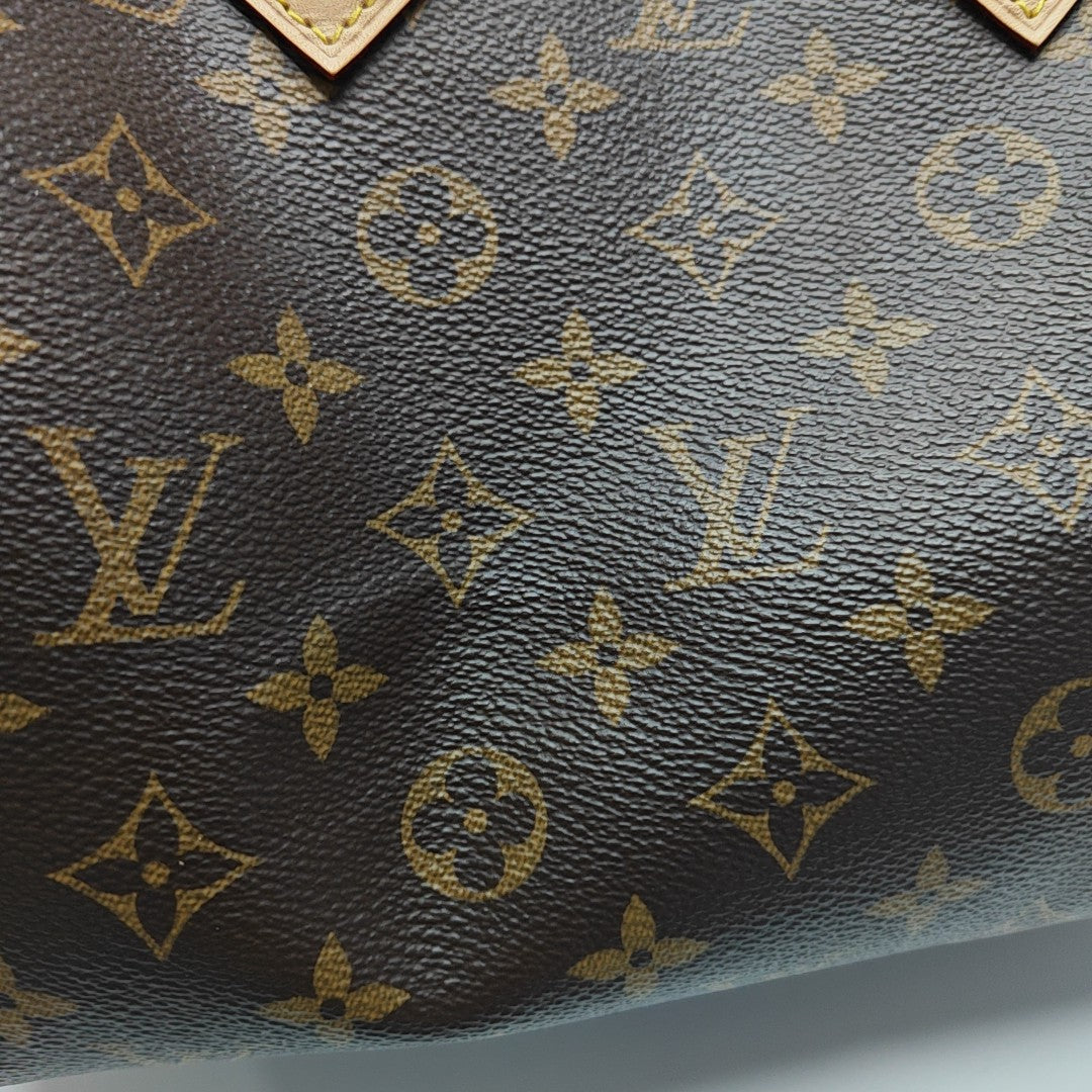 SPEEDY 25 Monogram Coated Canvas Brown