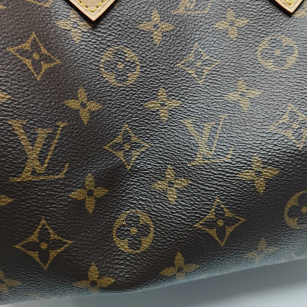 SPEEDY 25 Monogram Coated Canvas Brown