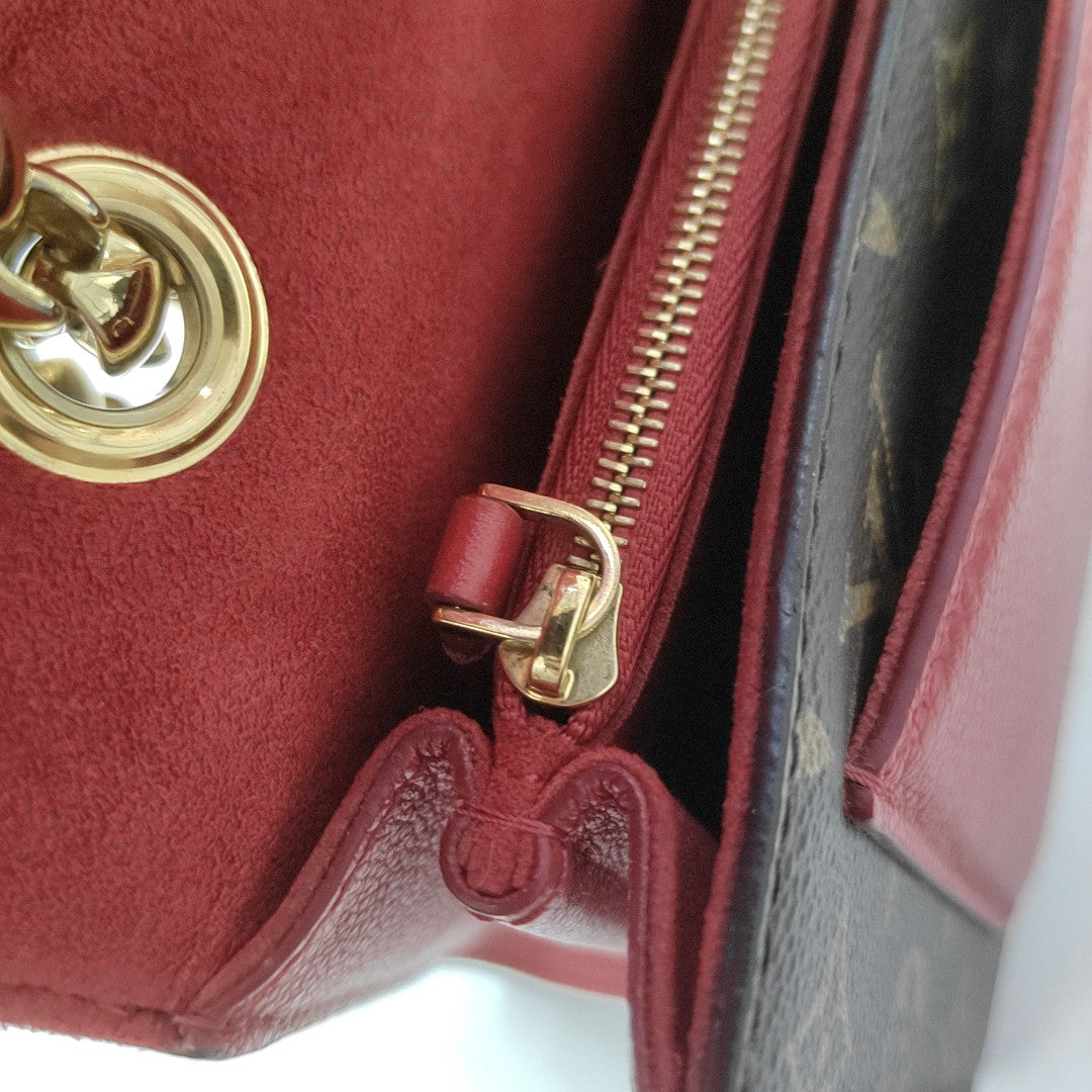 VICTOIRE Monogram Coated Canvas Brown