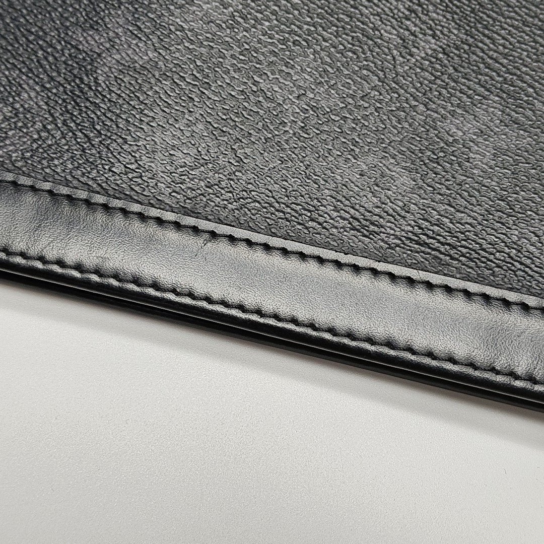 Pochette Voyag MM Monogram Coated Canvas Black