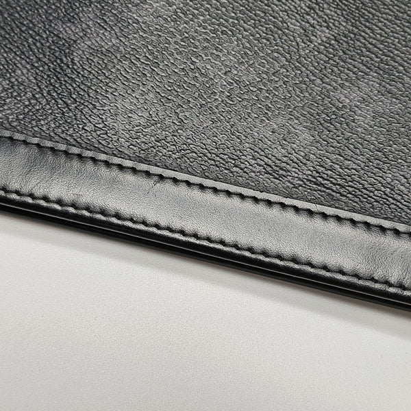 Pochette Voyag MM Monogram Coated Canvas Black