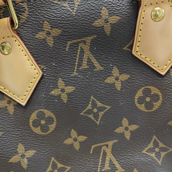 SPEEDY 25 Monogram Coated Canvas Brown