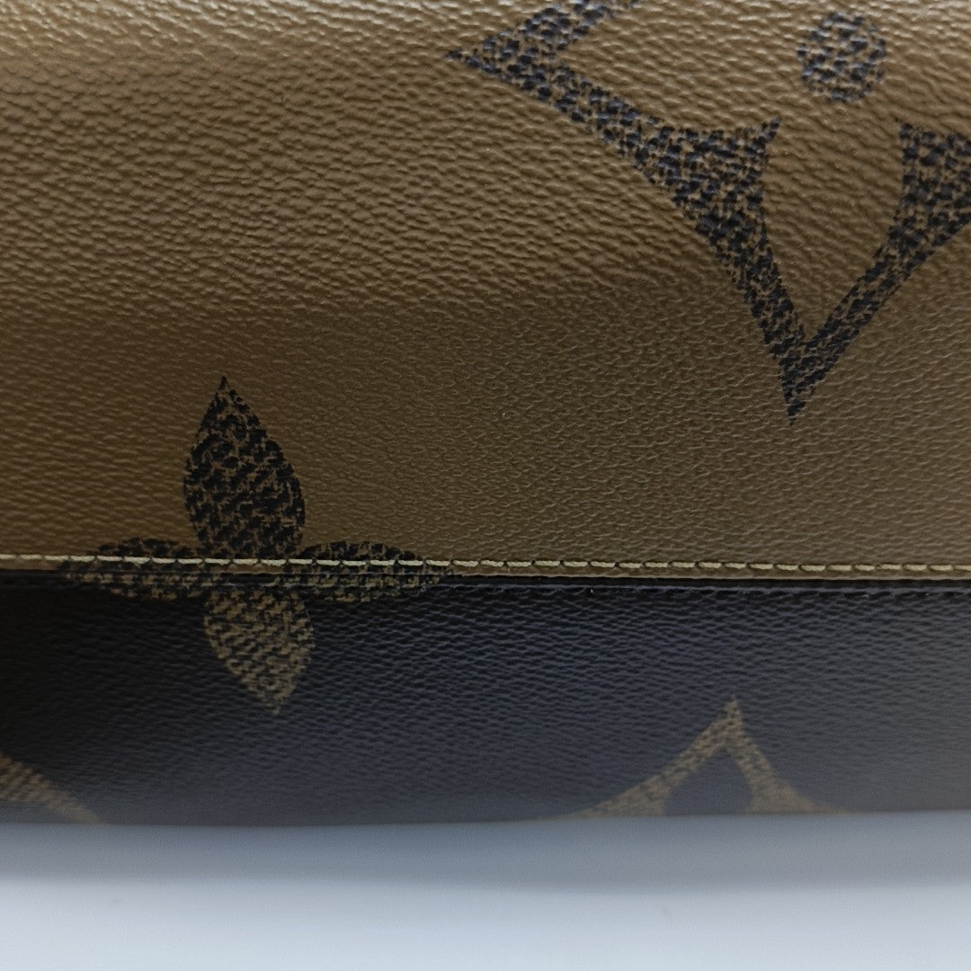 ONTHEGO MM Monogram Coated Canvas Brown